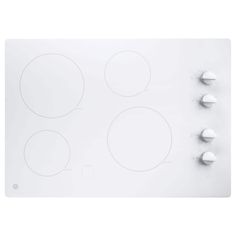 an electric cooktop with four burners and knobs on the side, in white