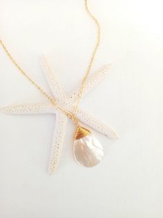 These beautiful necklaces are made from real Mother of Pearl shell on sterling silver or gold plated chain.  Beautiful as a Bride's Jewelry or as a Bridesmaid's Gift. The perfect choice for a unique dainty gift to your mother, daughter, best friend or just because you deserve it. Each item is carefully packaged in an elegant jewelry box.  If you would like to add a personalized note with your order, just write a note at checkout and I will send a small card with your gift to the recipient. If yo White Shell Necklace With Pearl Pendant As Gift, White Shell Charm Necklace As Gift, White Shell-shaped Jewelry With Pearl Pendant, White Shell Charm Necklace For Gift, White Shell Charm Necklace Gift, Elegant Teardrop Jewelry For Beach, Elegant Pearl Drop Necklaces For Beach, Elegant Teardrop Beach Jewelry, Dainty Shell Necklaces Perfect As Gifts