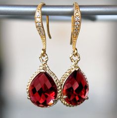 Ruby Red Teardrop Crystals Set in Gold with by CJRoseBoutique Cheap Red Evening Earrings, Elegant Cheap Red Earrings, Red And Gold Clip On Earrings, Elegant Red Teardrop Earrings At Cheap Price, Cheap Red Dangle Crystal Earrings, Cheap Elegant Red Teardrop Earrings, Luxury Red Pearl Earrings, Elegant Style, Luxury Red Clip-on Earrings For Evening, Cheap Handmade Red Crystal Earrings