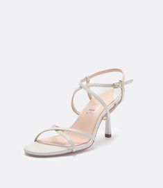 Front view of the white leather heel. White Strappy Sandals, White Leather Sandals, Strappy Sandals Heels, White Sandals, Effortless Elegance, Heels Sandals, Modern Chic, Shoe Style, Strappy Heels