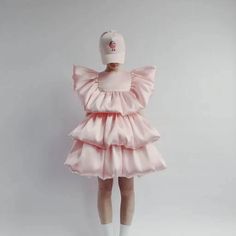 Caroline Bosmans, a mother of four, creates one-of-a-kind, fashion-forward designs with the practical needs of little ones in mind. This voluminous tiered dress is made of pink satin with gathering throughout and a zipped back..Material: 100% polyester.Care instructions: machine wash at 30 degrees.Made in Bulgaria.Designer color name: Flamingo.Closure: zipped back.Please refer to measurements in the measurements chart.With lining.Mid-weight material.Non-stretchy fabric Fitted Pink Ruffle Dress For Dress-up, Satin Ruffled Dress For Dress-up, Satin Ruffled Dress For Dress-up Occasions, Pink Ruffle Dress For Dress-up, Pink Ruffle Dress For Spring Dress-up, Pink Ruffle Dress For Dress-up Occasions, Pink Fitted Ruffle Dress For Dress-up, Pink Ruffle Dress For Spring Formal Occasions, Tiered Satin Dress With Ruffles