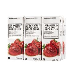 three boxes of strawberry juice blend on a white background