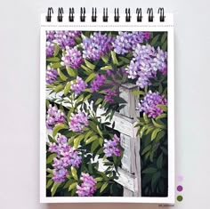 a drawing of purple flowers on a white wall next to a wooden fence with green leaves