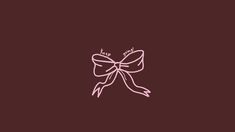 a pink bow on a brown background