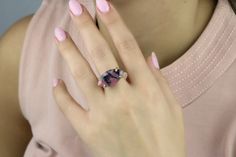 A unique semiprecious stone jewelry that flaunts a marquise natural Rhodonite gemstone in a classic claw setting. Lovely jewelry for women with stunning colors beautifully complemented with its gold finish. This stone ring is elegant to wear with a matching Rhodonite necklace and other stacking rings. ☛ 𝒜𝐵𝒞 - Add Engraving - https://etsy.me/2ZSRjhu ☛ Ring size - Select the size you would like from the drop down menu ♥ Gemstone Type - Rhodonite ♥ Gemstone Size - 12x22mm ♥ Gemstone Cut - Facete Unique Marquise Gemstone Rings, Unique Gemstone Rings Marquise Cut, Unique Marquise Cut Gemstone Rings, Marquise Cut Gemstone Crystal Ring, Marquise Gemstone Crystal Ring Gift, Marquise Crystal Ring With Gemstone For Gift, Multi-stone Marquise Jewelry Gift, Marquise Cut Gemstone Crystal Ring For Gift, Marquise Cut Multi-stone Diamond Ring As Gift