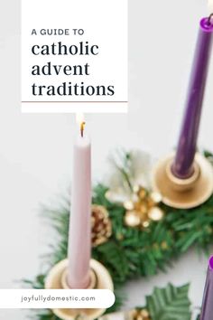 two candles with the words, a guide to catholic advent traditionss on top of them