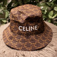 Authentic Celine Logo Triomphe Monogram Bucket Hat Of Sale. Never Worn. Too Small For Me. Luxury Wide Brim Summer Bucket Hat, Luxury Wide Brim Bucket Hat For Summer, Luxury Brown Hat With Embroidered Logo, Designer Adjustable Bucket Hat With Curved Brim, Paris Hat, Celine Logo, Celine Accessories, Women Hats, Brown Fashion