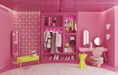 a room with pink walls and shelves filled with clothes, shoes, and other items