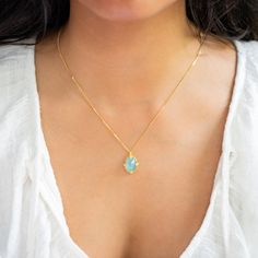 This Aquamarine is a perfect bubble swirling with mystical blue tones. We honored this gemstone by setting it in a handmade gold bezel accented with braided gold and granulated prongs. Technical Details Metal: 18k yellow goldAquamarine: 6.5 cts. Pendant Size: 17 x 13mmChain: can be worn at 16" and 18"Closure: lobster claspHandmade in New YorkStyle # N-2997-AQ Oval Cabochon Yellow Gold Necklace, Handmade Yellow Gold Necklace With Oval Cabochon, Oval Birthstone Necklaces, Unique Oval Birthstone Necklaces, Gold Jewelry With Gemstone Accents And Oval Cabochon, Yellow Gold Necklace With Oval Cabochon Birthstone, Gold Jewelry With Gemstone Accents In Oval Cabochon, Gold Jewelry With Gemstone Accents, Aquamarine Necklace