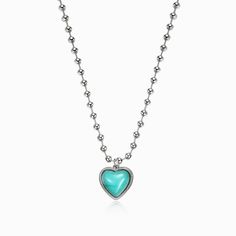 This Tiffany-blue heart necklace provides a pop of color and stands out in it's own right. Wear it on it's own or pair this look with the Angelic Necklace. Material: Platinum-plated Copper, Turquoise Weight:14.8g Size: 16.5 inches Angelic Necklace, Aquamarine Necklace, Mermaid Necklace, Copper Turquoise, Pearl Chain, Tiffany Blue, Blue Heart, Effortless Chic, Wear It