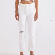 A Slim Straight Leg Jean With A High Rise And Vintage Construction. A Singular Statement Knee Rip Adds A Pop Of Skin To A Soft White Wash. Made With Tencel, A Plant-Based Fiber Created Without The Use Of Harmful Irrigation, Water Waste, Chemical Fertilizers, Pesticides Or Genetically Modified Seeds. Bleach-Free, Low Impact Wash Process Using 90% Less Water, 63% Less Energy And Clean Chemical Alternatives. Hangtags, Labels And Packaging Made Entirely From Recycled And Biodegradable Materials. Mat White Denim Jeans For Fall, Everyday White Cropped Leg Jeans, White Cropped Leg Jeans For Everyday, White Relaxed Fit Jeans For Day Out, White Denim Jeans For Day Out, White Jeans For Day Out, White Ripped Casual Jeans, White Mid-rise Casual Jeans, Casual High Rise White Jeans