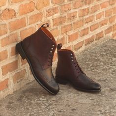 Custom Made Women's Military Brogue Boot in Burgundy and Dark Brown Painted Calf Leather Make them Uniquely Yours! Change the colors, change the material, or simply change the laces! Click below to customize these Women's Military Brogue Boots! [su_button url="https://augustapparel.com/custom-made/#/?b=P289NjA4X19hZjQ2M2JmMi1lNWI3LTQ3YTQtYTM4MS1lMWVjNjExODYwYWQ=" background="#e55417"  color="#000000" center= "yes" size="8"]Customize T Classic Brogue Lace-up Boots For Derby, Fall Gala Wingtip Dress Shoes, Leather Shoes With Brogue Detailing For Fall Galas, Classic Chukka Boots With Brogue Detailing And Cap Toe, Elegant Chukka Boots With Wingtip And Rubber Sole, Semi-formal Wingtip Chukka Boots With Rubber Sole, Elegant Goodyear Welted Wingtip Chukka Boots, Workwear Cap Toe Boots With Brogue Detailing, Workwear Brogue Cap Toe Boots