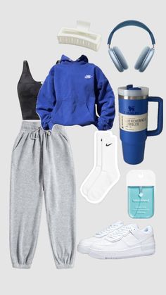 an outfit with headphones, coffee cup, and other items to wear on a gray background