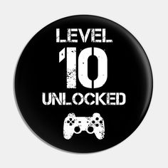 a black button with the words level 10 unlocked in white on it and an image of a video game controller