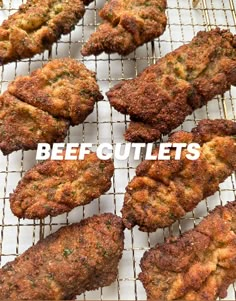 several pieces of meat sitting on top of a cooling rack with the words beef outlets above it