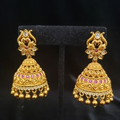 Pls, Note The hair extension jewelry shown in the 2 pics is just for display and not included in the price. Handmade Indian Temple Jewelry, best to wear it for traditional ceremonies or Indian weddings. This bridal jewelry has an ethnic finish. It has very small Cubic Zircon stones. It is a Bollywood style one gram jewelry These Jhumka Earrings set has an excellent finish and gives out an exquisite sense of style. If you are looking for an amazing Fashion Jewelry set for special occasions such a Ornate Jhumkas For Festivals With Pierced Ears, Elegant Ceremonial Jhumkas With Latkans, Elegant Jhumkas With Latkans For Ceremonial Occasions, Temple Jewelry Kundan Jhumkas For Pierced Ears, Ornate Jhumkas For Festive Occasions, Wedding Jhumkas With Latkans, Wedding Drop Jhumkas With Latkans, Wedding Drop Jhumkas, Wedding Tilla Drop Jhumkas