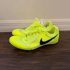 Nike Zoom Rival Multi Event Volt Track Spikes Size 8 Dc8749-700 Sporty Spring Training Running Shoes, Yellow Lace-up Athleisure Running Shoes, Nike Casual Running Shoes For Sports Events, Sporty Low-top Neon Yellow Running Shoes, Yellow Running Shoes With Laces For Sports, Sporty Neon Yellow Low-top Running Shoes, Yellow Athleisure Running Shoes With Round Toe, Casual Nike Running Shoes For Sports Events, Yellow Lace-up Running Shoes For Training