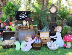 there are many items on the lawn that include pirate's chests and other things