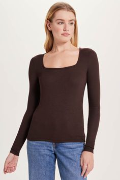 Editor’s pick: a buttery-soft ribbed top with a statement-making square neckline reminiscent of the Renaissance era. Pair her with anything, from a mini skirt to jeans, for a polished look. 96% modal, 4% spandex Luxe micro-rib knit with stretch Made in Peru Body length: 22” Machine wash Fall Square Neck Fitted Top, Casual Square Neck Tops For Fall, Brown Square Neck Top For Spring, Ribbed Square Neck Tops For Fall, Fitted Ribbed Top With Square Neck, Ribbed Square Neck Fall Tops, Ribbed Fitted Square Neck Top, Square Neck Ribbed Stretch Tops, Ribbed Square-neck Tops For Fall