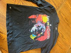 This is a very rare vintage Alice In Chains tour t-shirt. It's from the 90s (not newly made). The sleeves are pretty torn up, but the front and back are in good shape. This shirt is VINATGE. This shirt was worn by a human for years, over 30 years ago, and therefore wear-and-tear is part of it. There may be imperfections, fade, etc. that I didn't account for. Alice In Chains Facelift, 90s Concert, Alice In Chains, Concert Shirts, Tour T Shirts, The 90s, 30 Years, Vintage 90s, Favorite Outfit