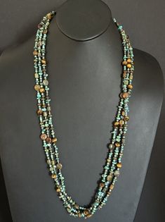 Native American Sterling Silver Multi Strand Turquoise Tigers Eye Bead Necklace 32" Turquoise Multi-strand Hand-strung Jewelry, Turquoise Double Strand Hand-strung Jewelry, Long Turquoise Necklace With Colorful Beads, Turquoise Long Necklace With Colorful Beads, Southwestern Multi-strand Turquoise Gemstone Necklace, Southwestern Multi-strand Turquoise Beaded Necklace, Southwestern Multi-strand Turquoise Beads, Turquoise Lariat Beaded Necklace Hand-strung, Turquoise Multi-strand Necklace With Gemstone Beads