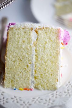 a slice of white cake on a plate