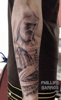 a man with a tattoo on his arm