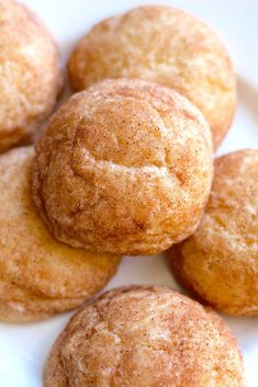 some sugary muffins on a white plate