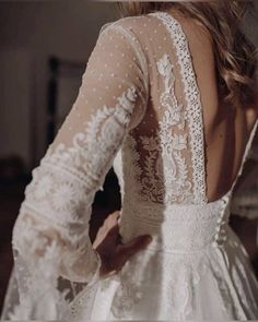 the back of a woman's wedding dress