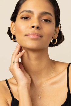 Radiant. Bold. Timeless. Our High Society Large Hoops are the statement earrings every fine jewelry collection needs. The wide, flattened solid gold tubes give them a classic, vintage feel, while the curved design creates a dome effect for maximum shine. Metal: 14 Karat Yellow Gold Dimensions: 6mm Width, 20mm Inner Diameter Construction: Solid Gold Tubing, Latch Closure Weight: 3 Grams Origin: Crafted in Arezzo, Italy Elegant 14k Gold Filled Huggie Jewelry, Tarnish Resistant Recycled Gold Huggie Earrings, Refined 14k Yellow Gold Earrings, Refined Gold Earrings For Anniversary, Elegant Gold Hoop Earrings In Recycled Gold, Timeless Yellow Gold Huggie Earrings Gift, Classic Everyday Hammered Hoop Earrings, Classic Hammered Hoop Earrings For Everyday, Classic Huggie Earrings In Recycled Gold