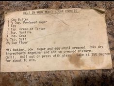 a piece of paper that is on top of a granite counter with instructions for making cookies