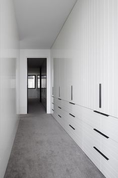 the instagram page on instagram shows an empty room with white walls and drawers