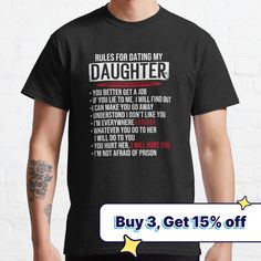 a man wearing a t - shirt that says rules for dating my daughter