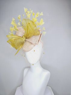 From the 2025 Featured Milliner of the Kentucky Derby Museum  Gorgeous Kentucky Derby hat fascinator  kentucky derby hat fascinator neutral beige sinamay with mesh veil, large mustard yellow mesh ribbon bow, light yellow branching feathers headband attachment.  each hat is totally one of a kind! no two are alike! *All hats are sold as displayed. No returns do to nature of product (headwear) Of course do not hesitate to contact me with any issues :) Check out my The Hat Doctor amazing news story Derby Hats Fascinators, Bow Light, Hat Fascinator, Feather Headband, Kentucky Derby Hat, Derby Hat, Mesh Ribbon, Derby Hats, Neutral Beige