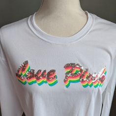 White Long Sleeve 'Campus Tee' By Pink Victoria's Secret. Rainbow 'Love Pink' Graphic Lettering With Silver Sequins / Bling. Oversized Fit. Tunic Length. New Without Tags. Size Medium. Approximate Measurements: Bust 20.5" Length 27.5" White Cotton Top For Pride, White Cotton Tops For Pride Festival, White Graphic Print Top For Pride, White Crew Neck Top For Pride, Graphic Lettering, Pink Vs, Silver Sequin, Tunic Length, White Long Sleeve