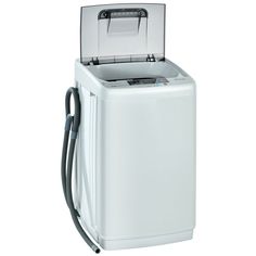 a white washing machine sitting on top of a white floor next to a black hose