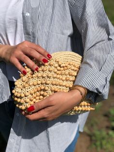 HANDMADE RAFFIA CLUTCH BAG Inspired by nature sustainable fashion ✅Any woman must have this bag for every fashionista.Whether you keeping it to yourself or gifting someone you care, it will be unforgettable. Daily use, a fashionable women's accessory for special occasions ✅I made this beautiful clutch from natural raffia yarn and bead. ✅The interior of the straw summer bag is fully lined with cotton and has a hidden metal lock. A lining of the appropriate color is sewn into the crochet raffia ba Natural Crochet Pouch Bag For Summer, Beaded Natural Color Beach Bag, Beaded Natural Straw Bag For Beach, Beaded Straw Beach Bag, Summer Beaded Crochet Bag For Daily Use, Beige Beaded Crochet Bag For Beach, Travel Bag With Beaded Details In Natural Color, Natural Beaded Straw Bag For Beach, Beaded Crochet Beach Bag For Summer