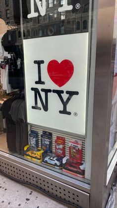 i love new york sign in the window of a store