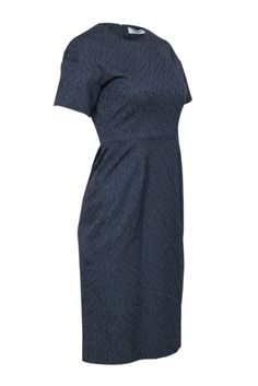 Unleash your whimsical side in M.M. LaFleur's navy vine jacquard short sleeve dress. With its playful navy vine pattern and polished, professional silhouette, this dress is perfect for adding a touch of fun to your work wardrobe. Style with a nude pointed toe pump for a sleek and stylish look! Size 0 62% Viscose, 37% Nylon, 1% Elastane Fully lined Short sleeve Invisible zipper back Bust 36" Waist 27" Shoulder to hem 39" Sleeve length 5.5" Mm Lafleur, Vine Pattern, Buy Shoes Online, Wardrobe Style, Work Wardrobe, Short Sleeve Dress, Touch Up, Invisible Zipper, Sweater Weather