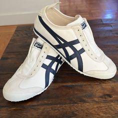 Women’s Brand New Onitsuka Tiger Mexico 66 Slip-On Shoes Navy And Beige Color. Unisex. Men’s: Size 42.5 Euro Size 9 Usa Women’s: Size 10.5-11 Usa