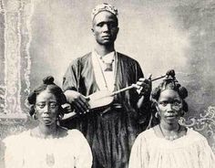 an old black and white photo of three women