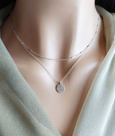 special trendy necklace. Consists of two chains to choose from: 1. Tiny bars necklace . Sterling Silver 925 2.Tiny Silver Disc Necklace 925 silver A perfect companion for our t bar necklace to complete the set! https://www.etsy.com/il-en/listing/912587739/y-shaped-necklace-elegant-necklace?ref=shop_home_active_6&pro=1&frs=1 Shown on the model: 15 inches + 17 inches MATERIALS All 925 Sterling Silver! in order to make your decision easier we offer: ♥ High Quality Designer Jewelry ♥ FREE Gi Silver Sterling Silver Charm Necklaces For Layering, Sterling Silver Clavicle Chain Layered Necklace, Sterling Silver Clavicle Chain Layered Necklace For Everyday, Silver Minimalist Layered Necklace With Round Pendant, Dainty Sterling Silver Chain Necklace For Layering, Silver Pendant Charm Necklace For Layering, Silver Double Chain Layered Necklace, Silver Layered Double Chain Necklace, Minimalist Adjustable Double Chain Necklaces