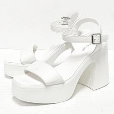 Step Out In These Light Weight Chunky Heel Sandals New In Box Faux Leatherette Material Lightly Padded Insole Adjustable Ankle Straps Comfy Light Weight Chunky Heels Platform Height: Approx 1.5 In. Heel Height: Approx 4.25 In. Fitting: True To Size White Ankle Strap Block Heels With Chunky Platform, White Block Heels With Chunky Platform And Ankle Strap, White Wedge Heel Block Heels, Trendy White Platform Block Heels, Trendy White Block Heels With Platform, White Platform Block Heels For Summer, Trendy White Block Heels With Stacked Heel, Summer White Platform Block Heels, Summer White Block Heels With Platform