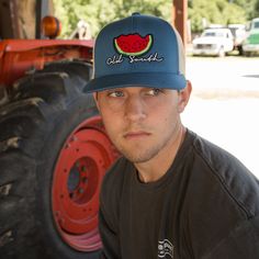 Keeping the hot southern sun out of your eyes and away from your face is important during the heat of June, July and August--both for guys and gals. Our classic, wide-brimmed trucker hat subtly announces your southern roots while shading your head and face. Crown: Structured Pro Crown | Pro-Stitched Finish | Adjustable Snap-Back Visor: Pre-Curved | Curved or Flat - Shape It How You WantSweatband: 3-Part Comfort Cotton FitClosure: Plastic Adjustable Snap-Back Sizes: Adult | One Size Fits Most Casual Snapback Hat With Wide Brim For Outdoor, Casual Curved Brim Snapback Hat For Country Events, Casual Wide Brim Snapback Hat For Outdoor, Summer Trucker Hat With Flat Brim, Summer Outdoor Trucker Baseball Cap, Retro Summer Hat With Flat Bill, Trucker Baseball Cap For Summer Outdoor, Trucker Hat With Flat Bill For Beach, Summer Trucker Baseball Cap