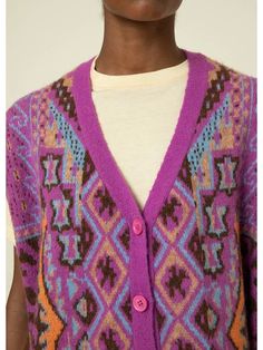 Add a pop of color and texture to your outfit with our Magenta Multicolored Cardigan. This beautiful magenta cardigan vest is soft and chic with a 90's vibe. It can be worn layered or on its own, making it the perfect accessory for any outfit. Perfect for layering in the cooler months or on its own. Made from soft, high quality wool, this oversized sweater is as cozy as it is cute! Style Tip: Wear our Multicolor Cardigan Vest layered over turtlenecks or tanks and paired with jeans or skirts, it' Luxury Multicolor Spring Cardigan, Luxury Multicolor V-neck Cardigan, Luxury Multicolor Layering Sweater, Cheap Multicolor Cotton Sweater Vest, Magenta Cardigan, Multicolor Cardigan, 90s Vibes, Cute Style, Cardigan Vest