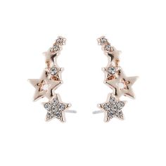 These 18K gold-plated star earring climbers are a stunning and unique addition to any jewelry collection. The climbers are crafted from high-quality metal with an 18K gold plating, which has a luxurious and radiant shine that adds to their beauty. The design of the climbers features a star shape that sits along the curve of the earlobe, creating a dramatic and eye-catching effect. Genuine crystals are set into the stars, adding a touch of sparkle and elegance to the design. The crystals are care Beautiful Diamond Earrings, Moon Stud Earrings, Y2k Jewelry, Rhinestone Fashion, Moon Studs, Climber Earrings, Tiny Star, Star Earrings Stud, Star Moon