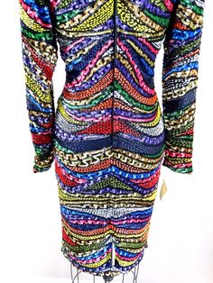 "This is an exquisite vintage piece fully embellished, all hand beaded with colorful sequins and beading. It's in perfect condition! Bust - 34\" Waist - 26\" Hips - 35\" Length - 39\" Size - (please refer to measurements) This dress comes from a pet-free and smoke-free home. If you would like more info or have any questions, please don't hesitate to ask!" Iridescent Dress, Checkered Jacket, Dress Art, Deco Retro, Dress Retro, Retro Rainbow, Sequin Jacket, Art Dress, Embellished Dress