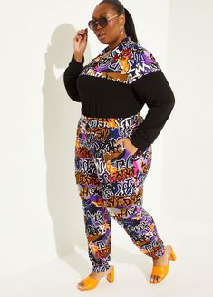 We're not getting "jiggy" with it anymore, but that doesn't stop the reemergence of your favorite 90s to the 2000s style like our graffiti print joggers made from soft brushed jersey. Trendy Multicolor Sweatpants For Streetwear, Trendy Multicolor Streetwear Sweatpants, Hip Hop Style Loungewear Bottoms With Graphic Print, Multicolor Sweatpants For Streetwear In Spring, Multicolor Relaxed Fit Sweatpants For Streetwear, Fall Graphic Print Sweatpants For Streetwear, Relaxed Fit Multicolor Sweatpants For Streetwear, Multicolor Sweatpants For Streetwear With Elastic Waistband, Multicolor Sweatpants For Streetwear