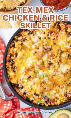 tex - mex chicken and rice skillet with tortilla chips on the side