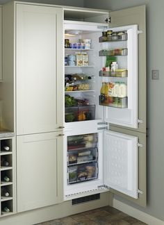 an open refrigerator with its door wide open